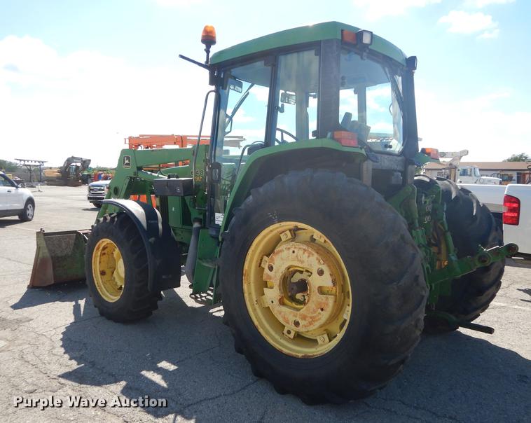image for item DF1761 2001 John Deere 6310 MFWD tractor