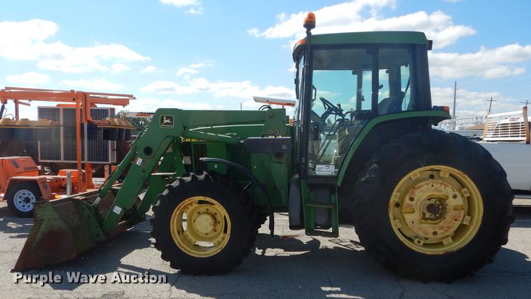 image for item DF1761 2001 John Deere 6310 MFWD tractor