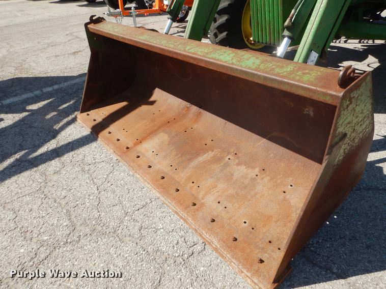 image for item DF1761 2001 John Deere 6310 MFWD tractor