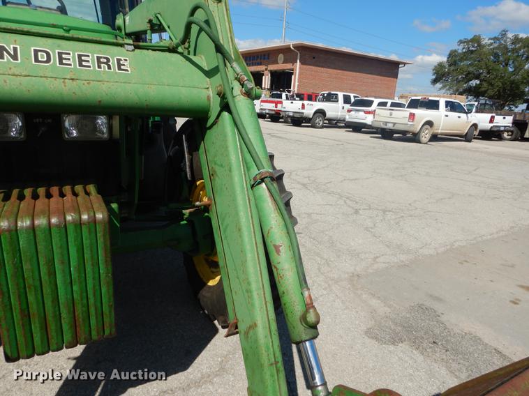 image for item DF1761 2001 John Deere 6310 MFWD tractor