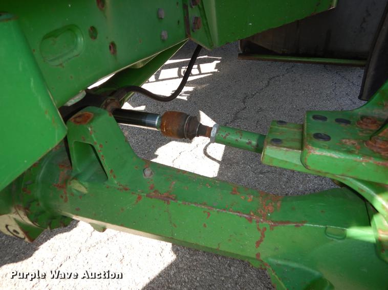 image for item DF1761 2001 John Deere 6310 MFWD tractor
