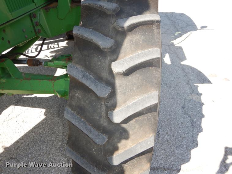 image for item DF1761 2001 John Deere 6310 MFWD tractor