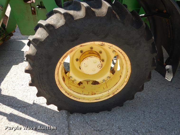 image for item DF1761 2001 John Deere 6310 MFWD tractor