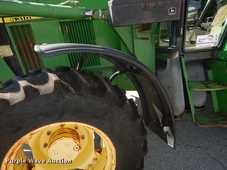 image for item DF1761 2001 John Deere 6310 MFWD tractor