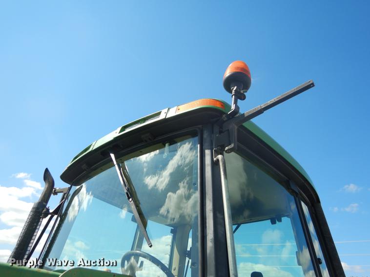 image for item DF1761 2001 John Deere 6310 MFWD tractor