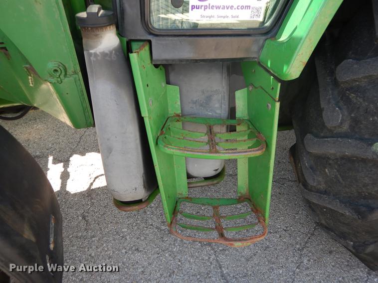 image for item DF1761 2001 John Deere 6310 MFWD tractor