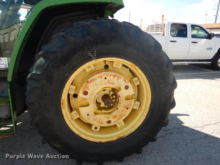 image for item DF1761 2001 John Deere 6310 MFWD tractor