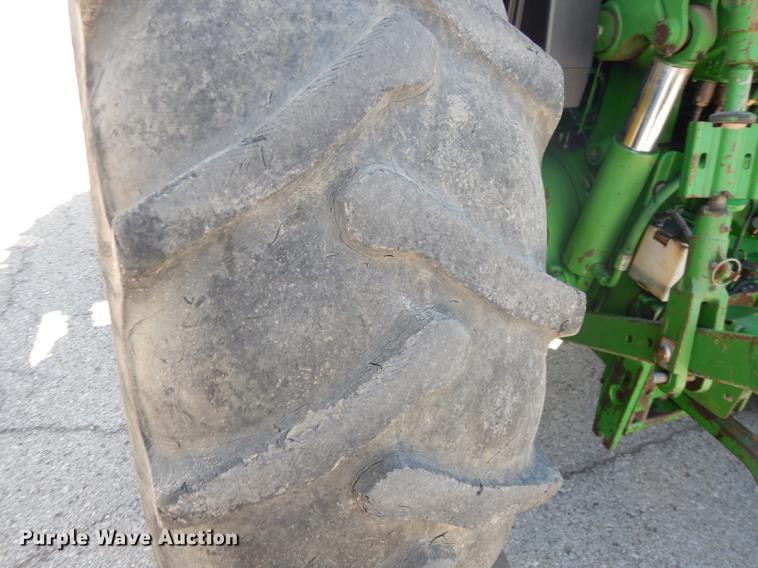 image for item DF1761 2001 John Deere 6310 MFWD tractor