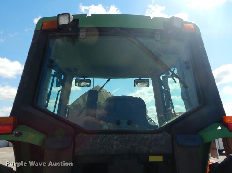 image for item DF1761 2001 John Deere 6310 MFWD tractor