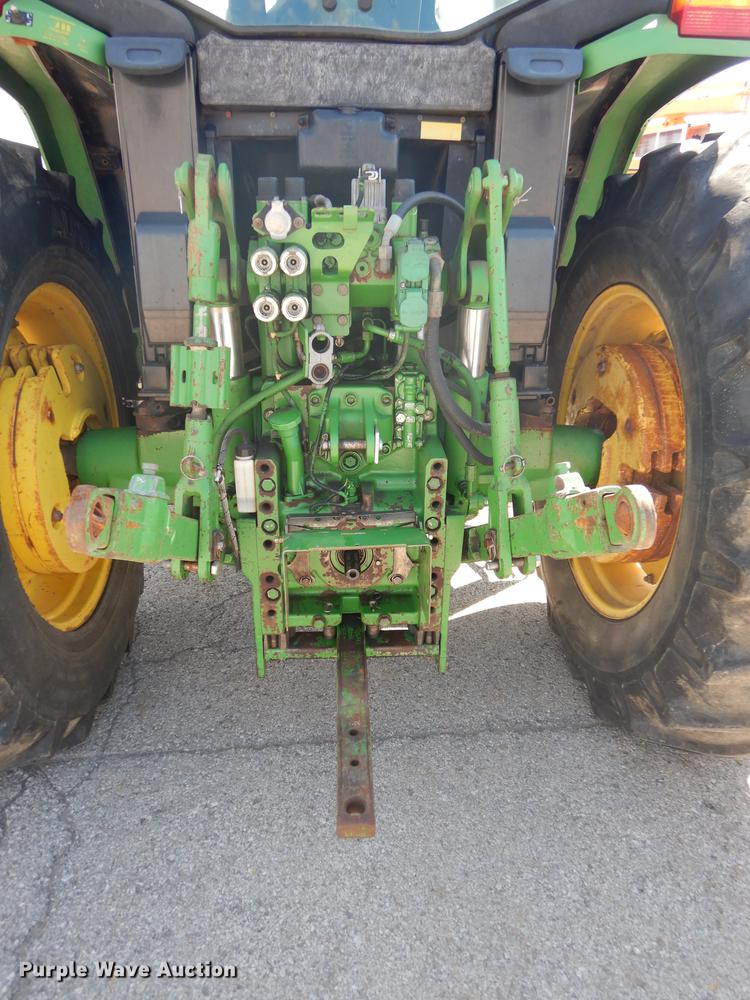 image for item DF1761 2001 John Deere 6310 MFWD tractor