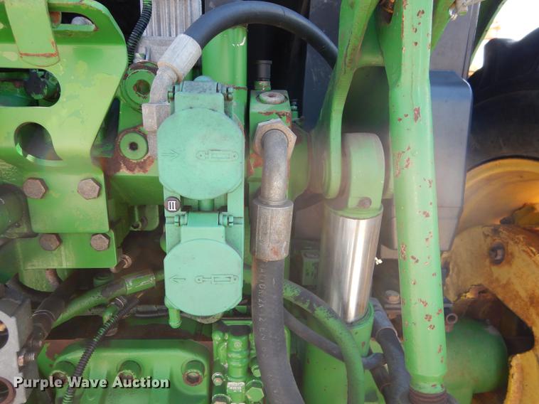 image for item DF1761 2001 John Deere 6310 MFWD tractor