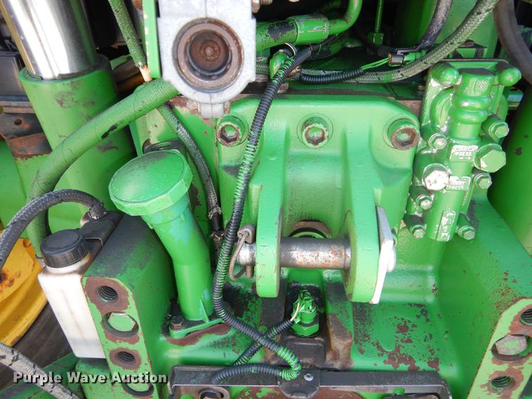 image for item DF1761 2001 John Deere 6310 MFWD tractor