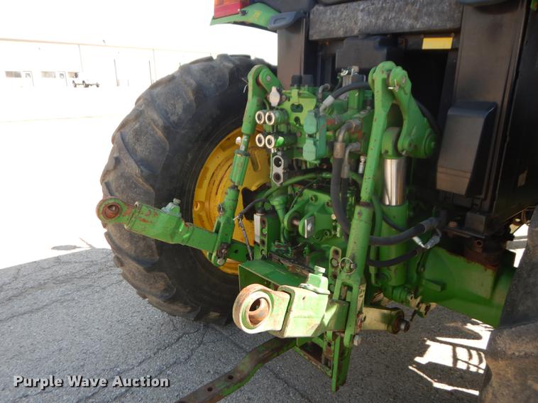 image for item DF1761 2001 John Deere 6310 MFWD tractor