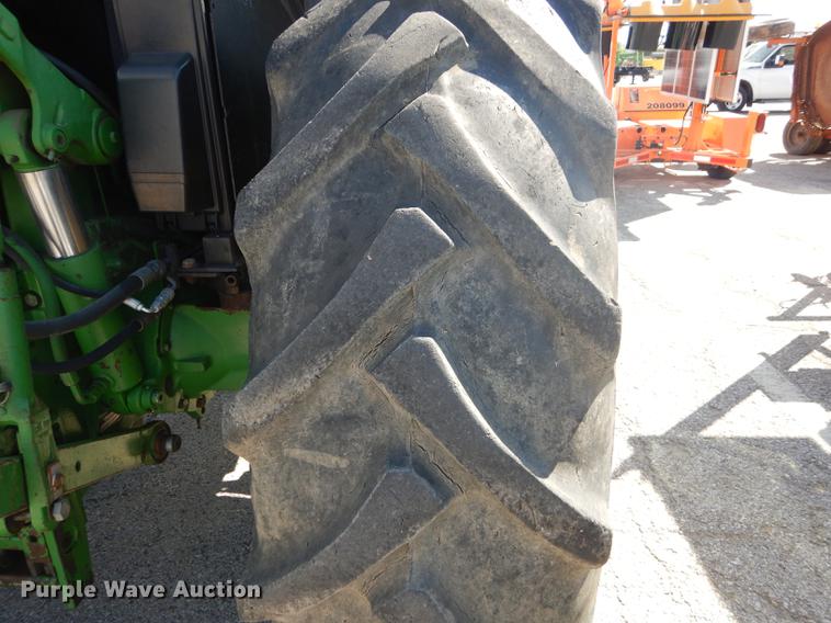 image for item DF1761 2001 John Deere 6310 MFWD tractor