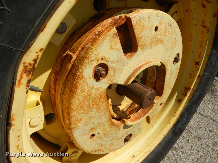 image for item DF1761 2001 John Deere 6310 MFWD tractor