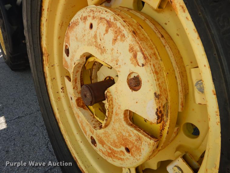 image for item DF1761 2001 John Deere 6310 MFWD tractor