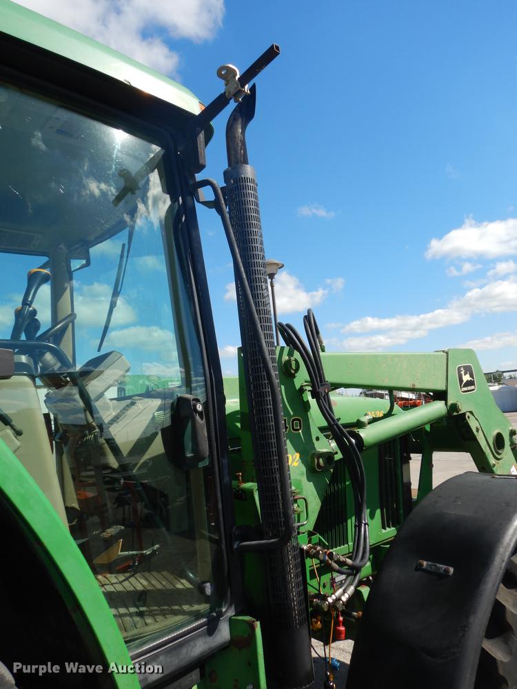 image for item DF1761 2001 John Deere 6310 MFWD tractor