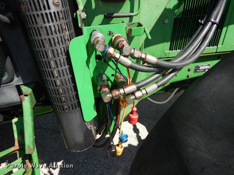 image for item DF1761 2001 John Deere 6310 MFWD tractor