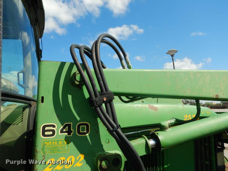 image for item DF1761 2001 John Deere 6310 MFWD tractor