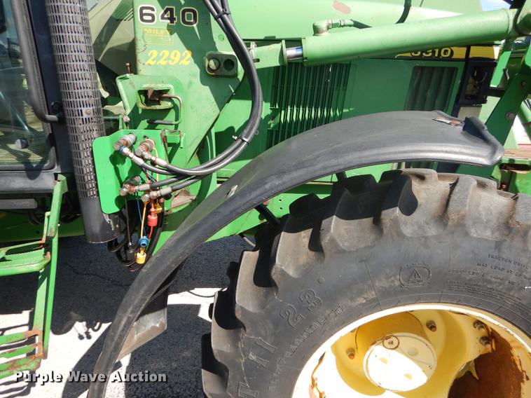 image for item DF1761 2001 John Deere 6310 MFWD tractor