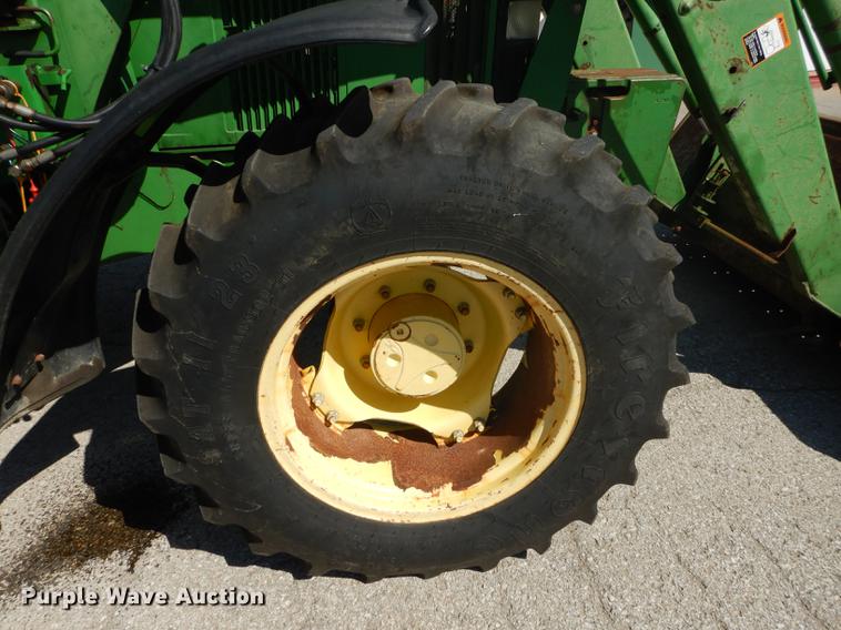 image for item DF1761 2001 John Deere 6310 MFWD tractor