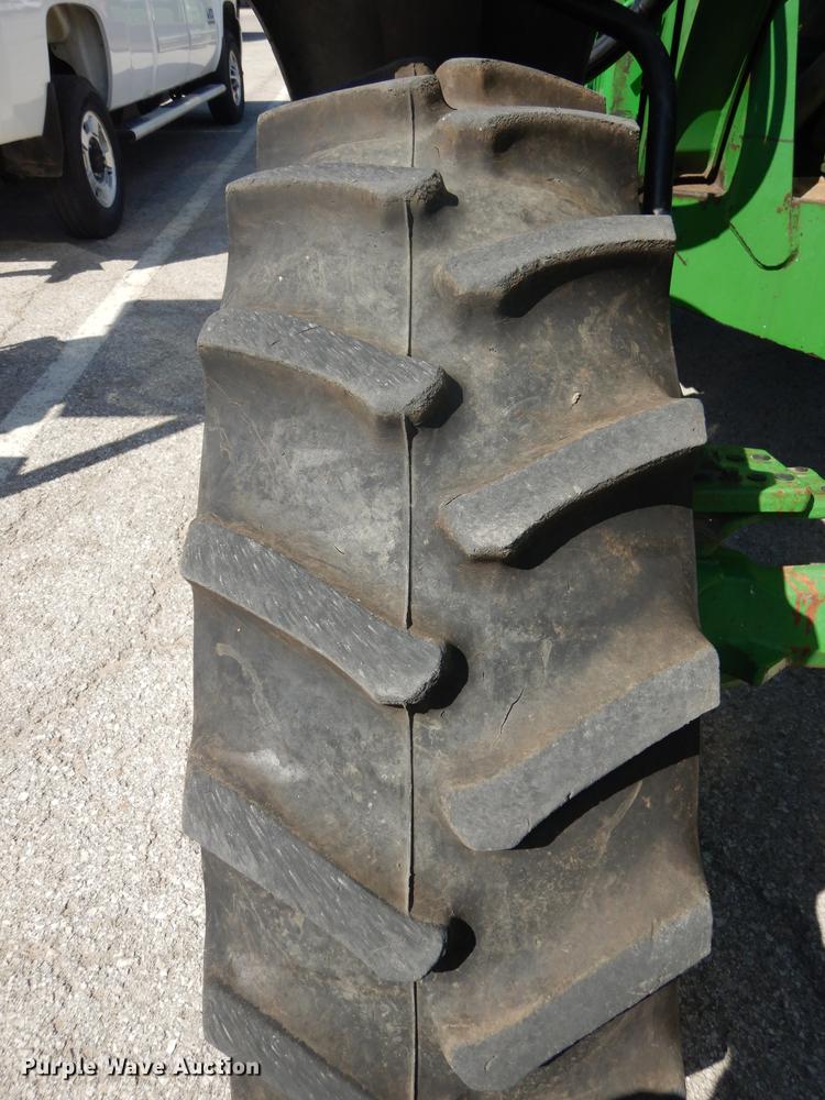 image for item DF1761 2001 John Deere 6310 MFWD tractor