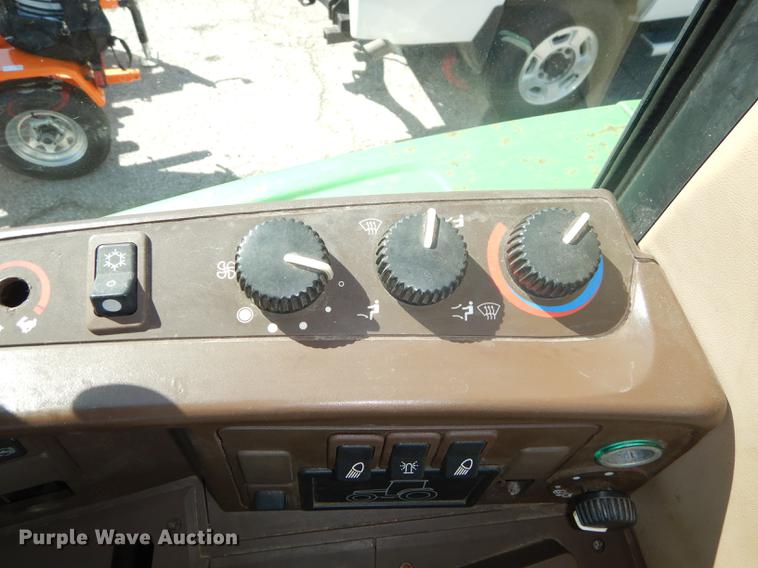 image for item DF1761 2001 John Deere 6310 MFWD tractor