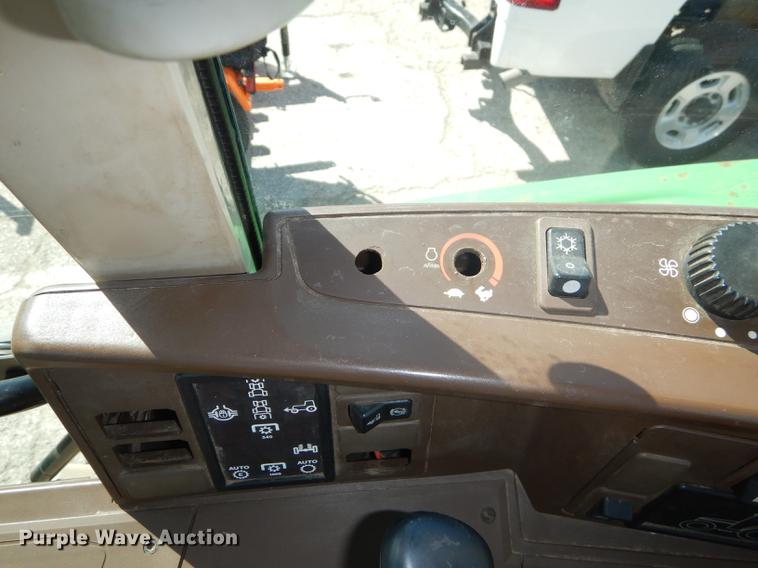 image for item DF1761 2001 John Deere 6310 MFWD tractor