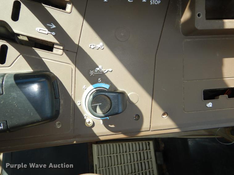 image for item DF1761 2001 John Deere 6310 MFWD tractor