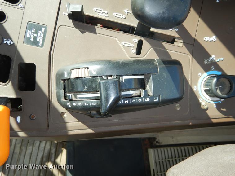 image for item DF1761 2001 John Deere 6310 MFWD tractor