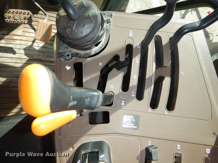 image for item DF1761 2001 John Deere 6310 MFWD tractor