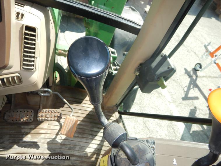 image for item DF1761 2001 John Deere 6310 MFWD tractor