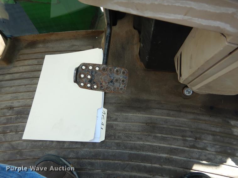 image for item DF1761 2001 John Deere 6310 MFWD tractor