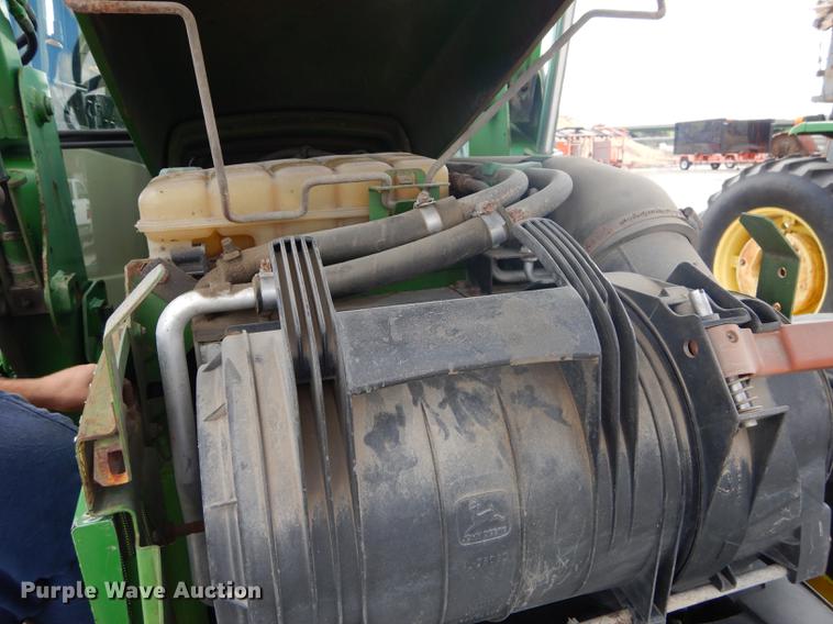 image for item DF1761 2001 John Deere 6310 MFWD tractor