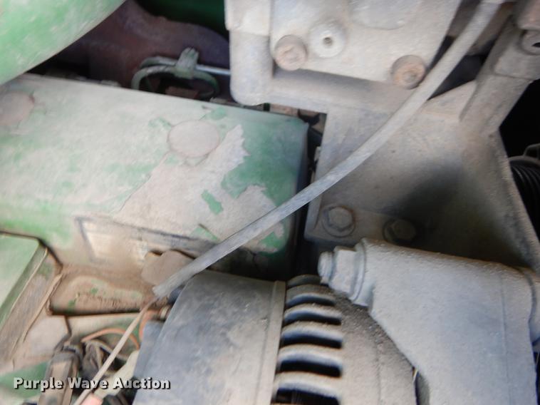 image for item DF1761 2001 John Deere 6310 MFWD tractor