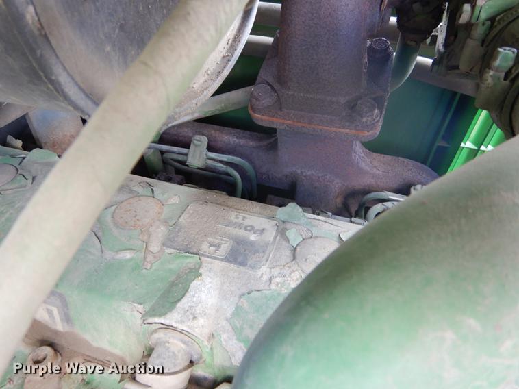 image for item DF1761 2001 John Deere 6310 MFWD tractor