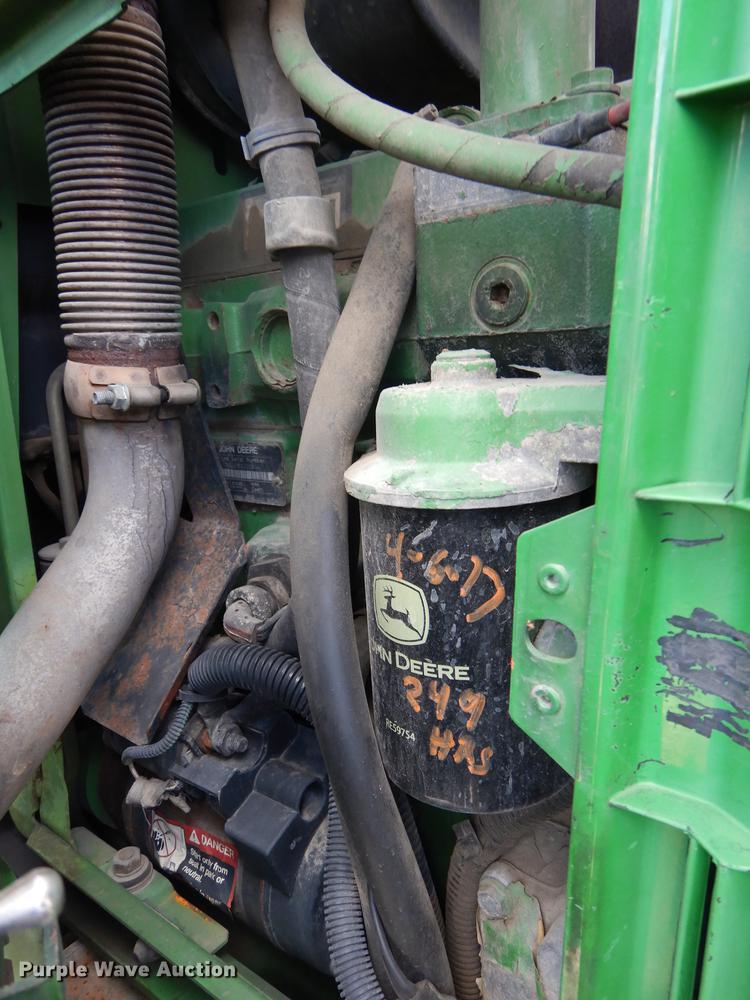 image for item DF1761 2001 John Deere 6310 MFWD tractor