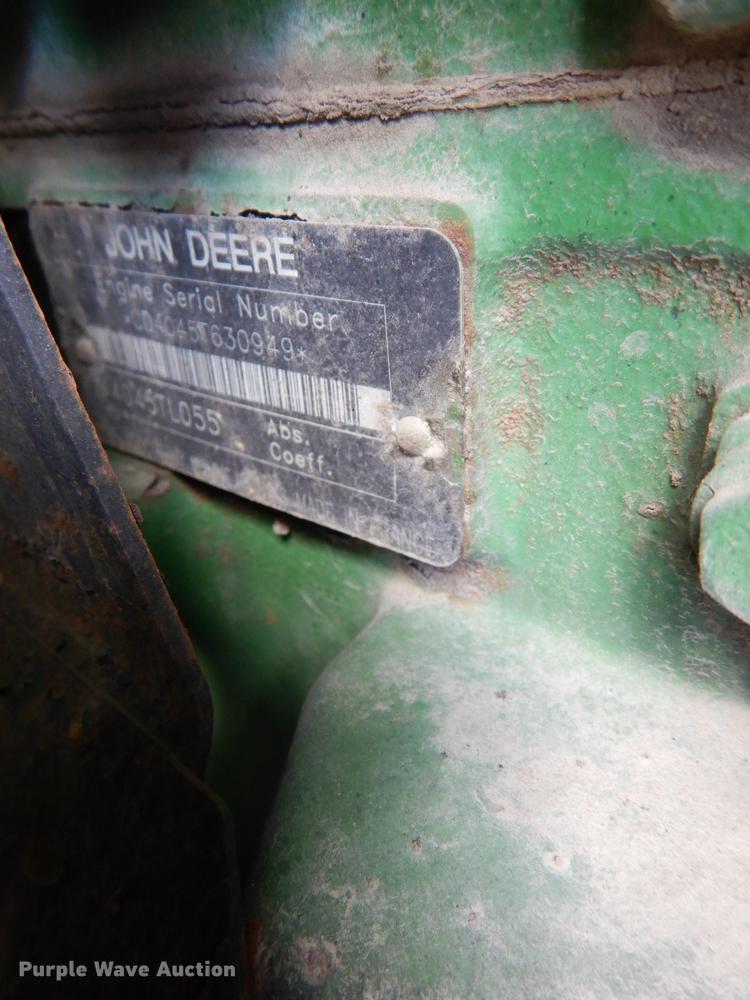 image for item DF1761 2001 John Deere 6310 MFWD tractor