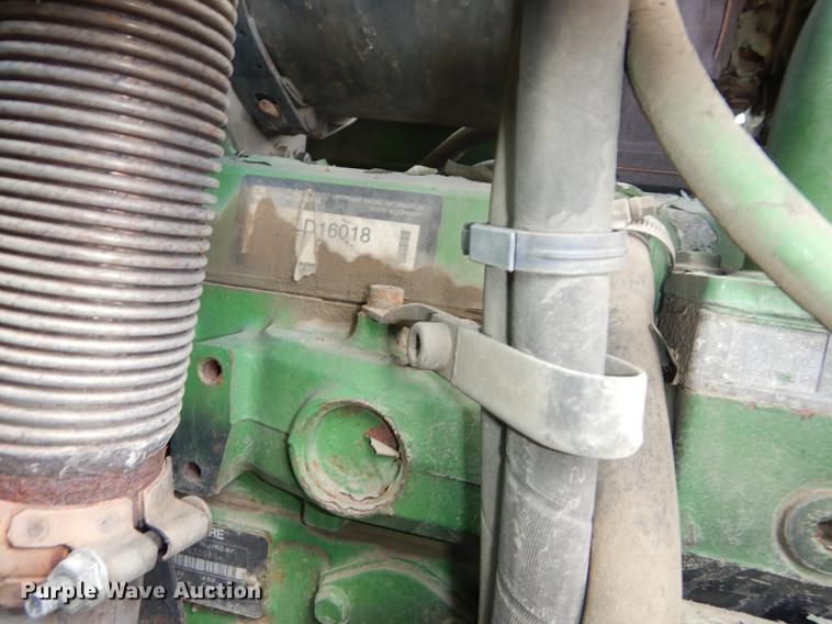 image for item DF1761 2001 John Deere 6310 MFWD tractor