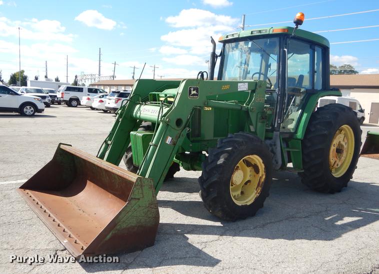 image for item DF1762 2001 John Deere 6310 MFWD tractor