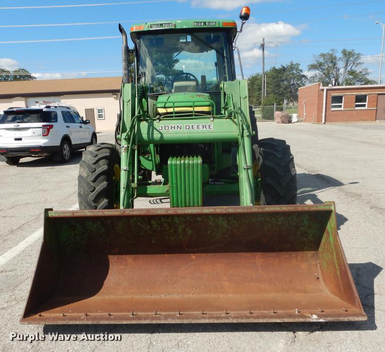 image for item DF1762 2001 John Deere 6310 MFWD tractor