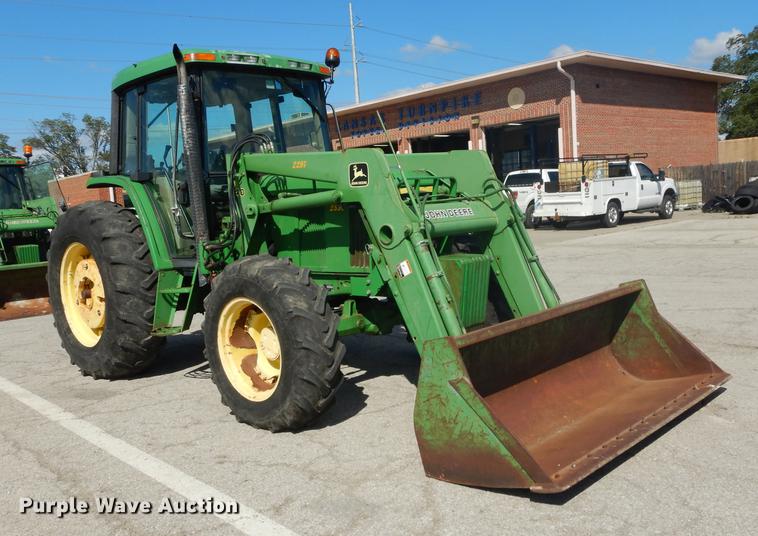 image for item DF1762 2001 John Deere 6310 MFWD tractor