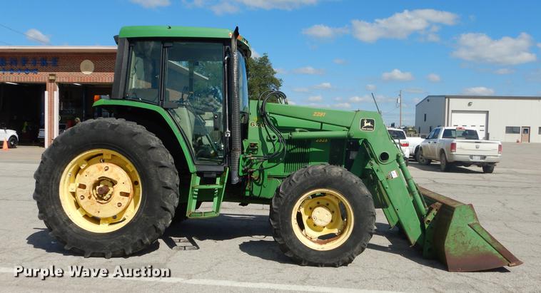 image for item DF1762 2001 John Deere 6310 MFWD tractor