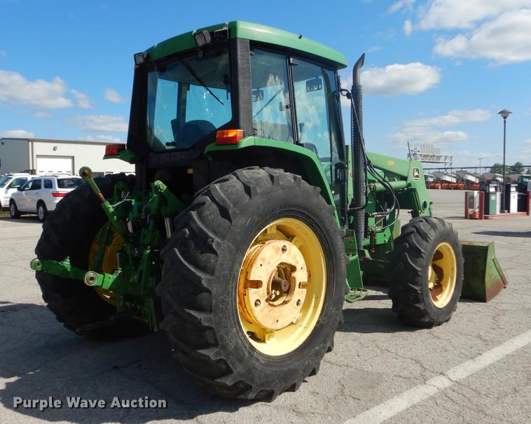 image for item DF1762 2001 John Deere 6310 MFWD tractor