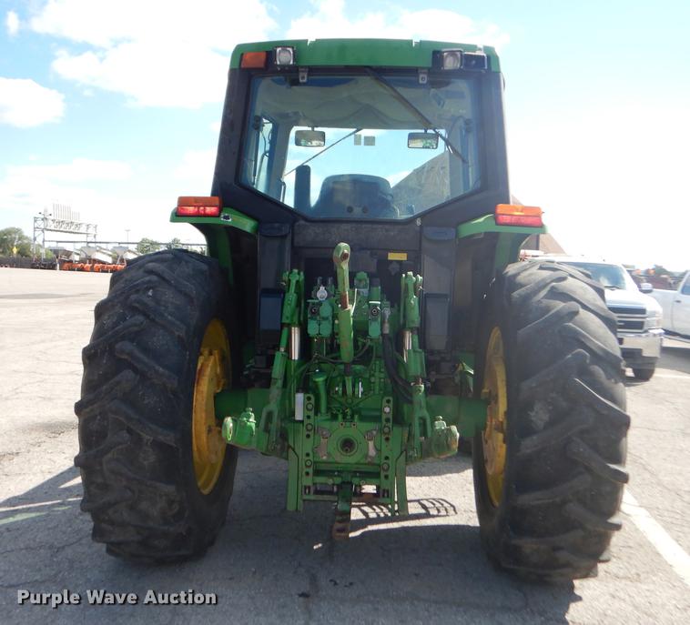 image for item DF1762 2001 John Deere 6310 MFWD tractor