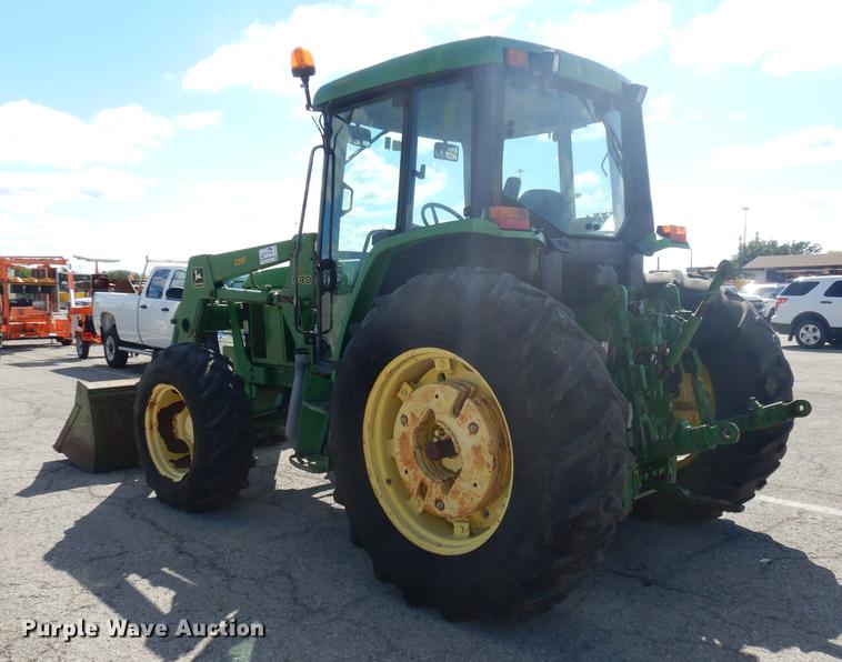 image for item DF1762 2001 John Deere 6310 MFWD tractor