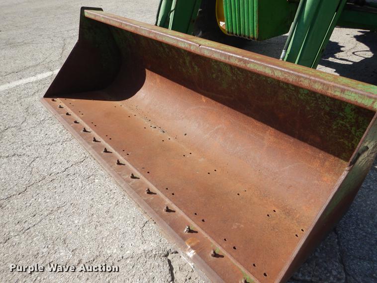 image for item DF1762 2001 John Deere 6310 MFWD tractor