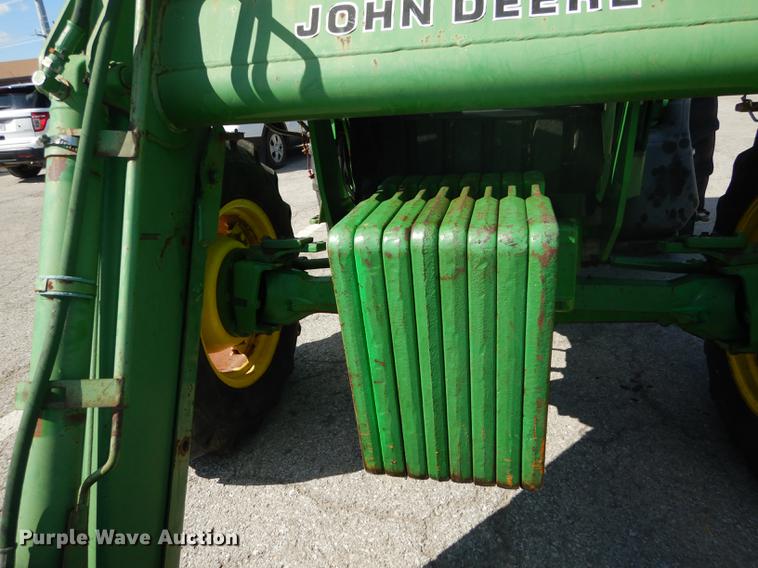 image for item DF1762 2001 John Deere 6310 MFWD tractor