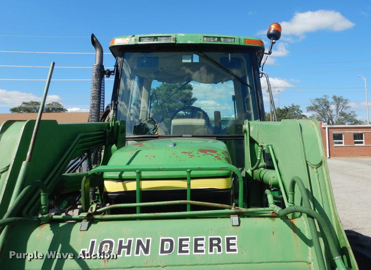image for item DF1762 2001 John Deere 6310 MFWD tractor