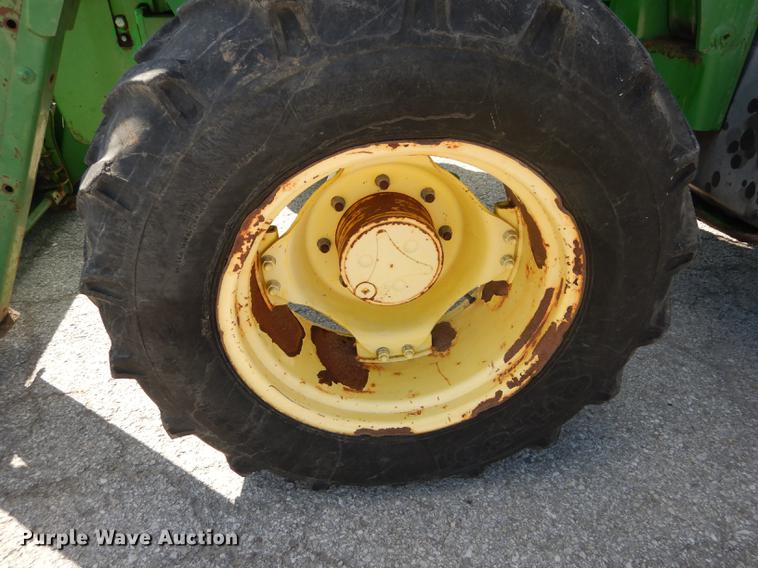 image for item DF1762 2001 John Deere 6310 MFWD tractor